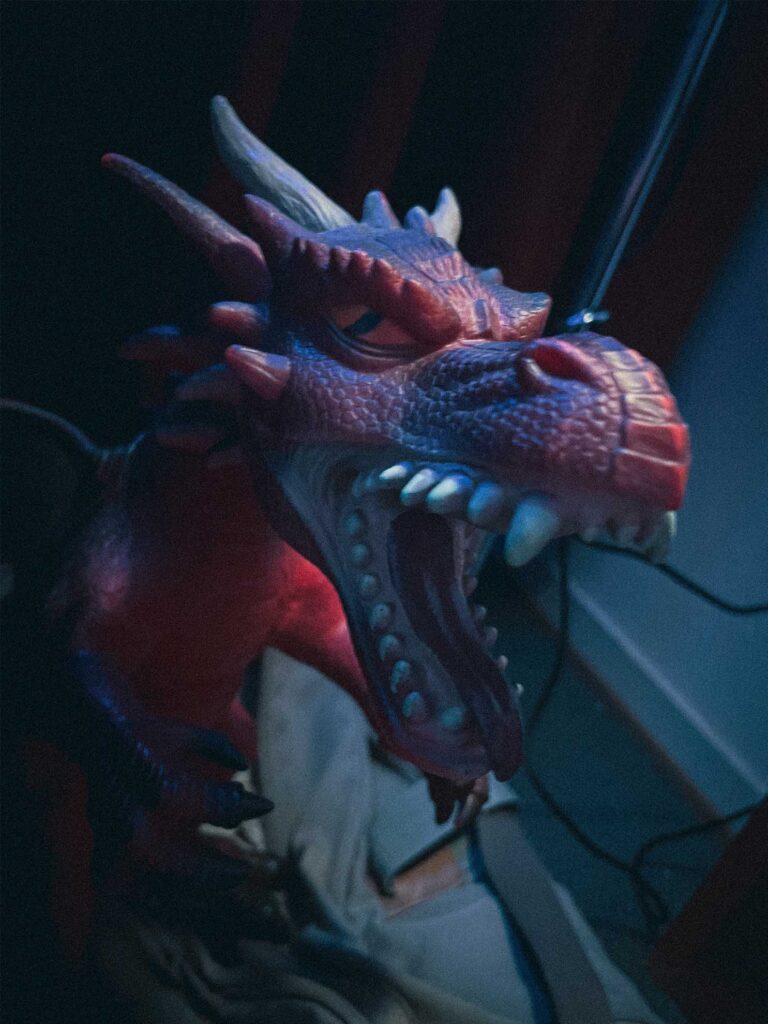 Sweet Will (2026) production design, stills from set Sweet Will (2026) – Production Design for short film, detail of a dragon, nostalgic teen car interior, cold light, analog clutter, mysterious mood