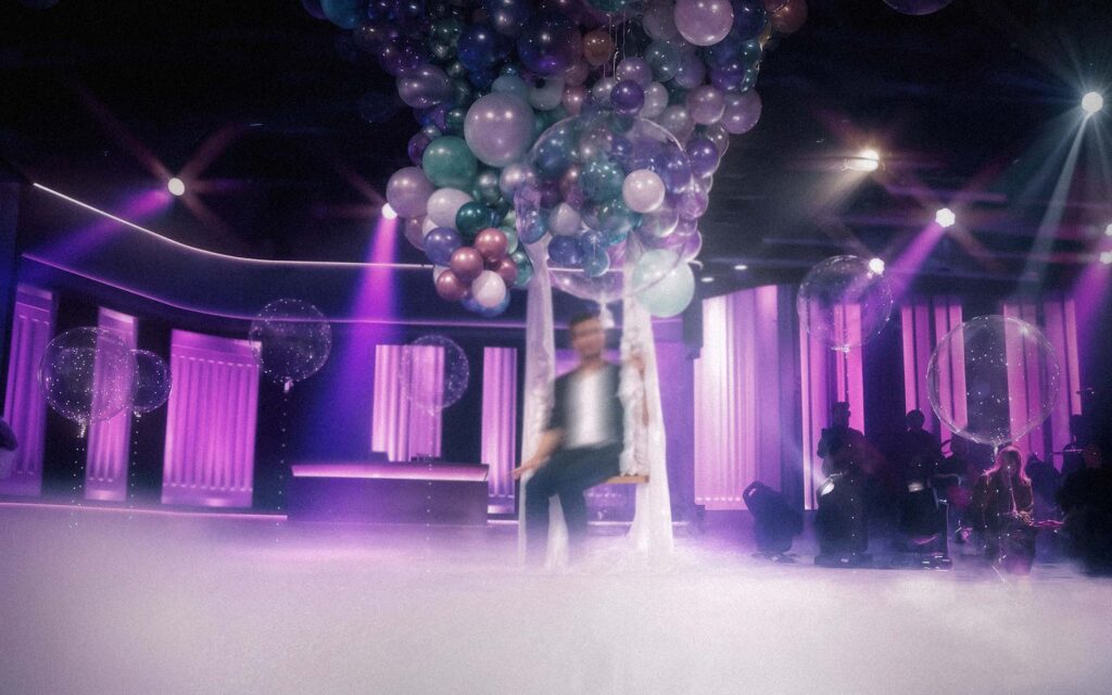 ZDF Magazin Royale - Micha (2022) – Stage Design for live concert, performer beneath balloon canopy, purple lighting, fog and audience silhouette