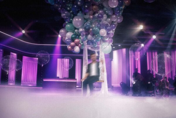 ZDF Magazin Royale - Micha (2022) – Stage Design for live concert, performer beneath balloon canopy, purple lighting, fog and audience silhouette